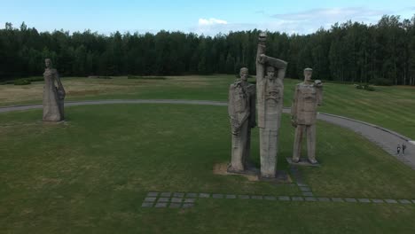 Aerial-lateral-long-shot-of-the-statues-of-Salaspils-memorial,-Latvia