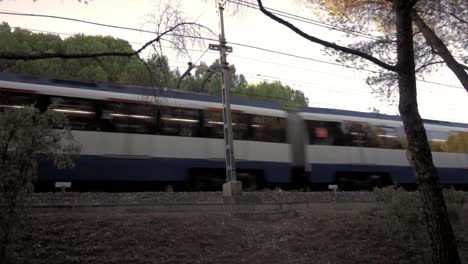 Madrid-underground-train,-Metro,-Line-10-going-overground-through-Casa-de-Campo