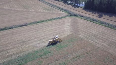 AERIAL-farmer-harvesting,-Valmet-forefront-of-productivity-enhancing-technologies-for-harvesters