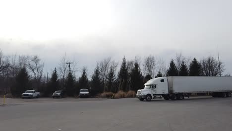 White-Truck-pulling-up-to-stop