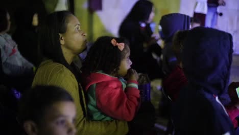 A-child-watches-a-movie-while-eating-popcorn