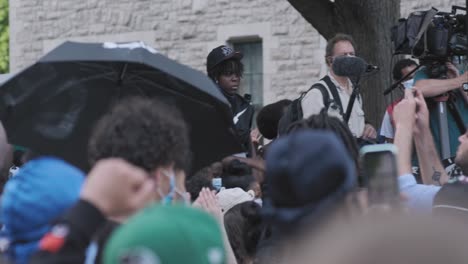 Long-panning-shot-of-a-large-Black-Lives-Matter-protest