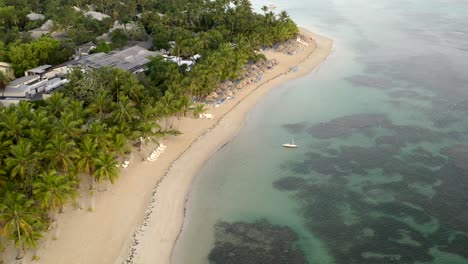 Drone-view-of-ocean-waves-and-sandy-Caribbean-beach,Grand-Bahia-Principe-beach-at-Samana-peninsula,Dominican-republic