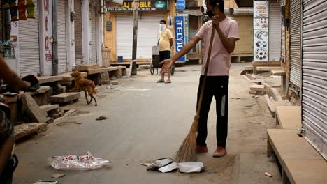 government-worker-sweeping-streets-in-the-COVID-19-crisis-lockdown