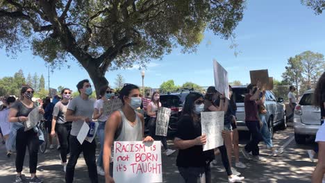 Peaceful-protest-against-police-brutality-with-hundreds-of-people-carrying-signs-from-Burgess-Park-in-San-Francisco-Bay-Area-in-wake-of-death-of-George-Floyd,-killed-by-Minneapolis-police-officer