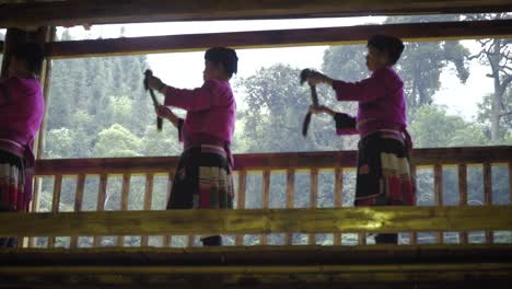 Women-walking-on-a-balcony-during-a-performance