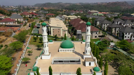 Aerial-fly-over-of-the-mosque-at-the-legislative-quarters-in-Abuja,-Nigeria