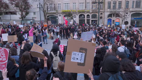 Porto---Portugal---june-6th-2020:-BLM-Black-Lives-Matter-Protests-Demonstration-camera-pan-over-crowd-protesting-and-shouting-with-masks