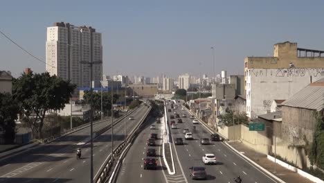 wide-view-of-cityscape-and-traffic-on-the-East-West-connection,-named-Radial-Leste-Avenue