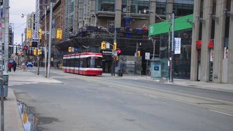 The-almost-empty-Queen-Street-of-Toronto,-Canada-due-to-the-Corona-Virus-pandemic---slowmo