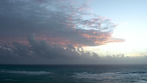 Beautiful-Sunrise-Sky-Over-a-Peaceful-and-Tranquil-Ocean