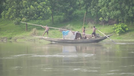 Beautiful-riverside-view-where-a-boat-is-passing-by