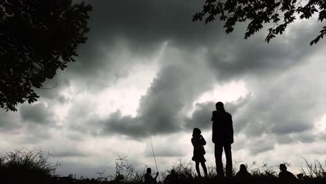 a-father-is-with-his-daughter,-a-silhouette