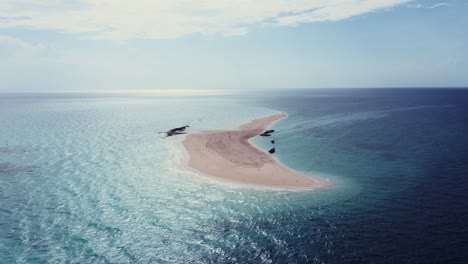 Aerial-drone-view-of-a-sand-bank-in-the-middle-of-the-ocean