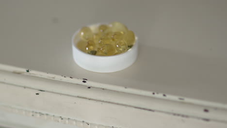 4K-video-of-Vitamin-D-supplements-on-the-top-of-a-white-dresser