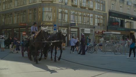 Jib-and-tilt-up-shot-from-horse-carriage-to-St