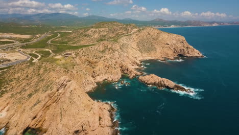 Wide-Drone-Shot-Over-Coastal-Cliffs-and-Ocean-in-Cabo,-Mexico