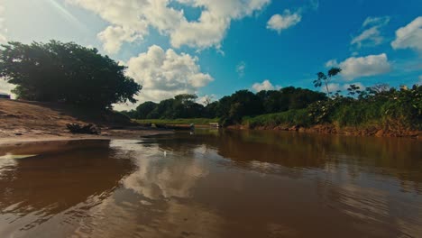 Suerte-River,-exploring-the-tropical-rainforest-in-Tortuguero-national-park-in-Costa-Rica,-Central-America-in-4K