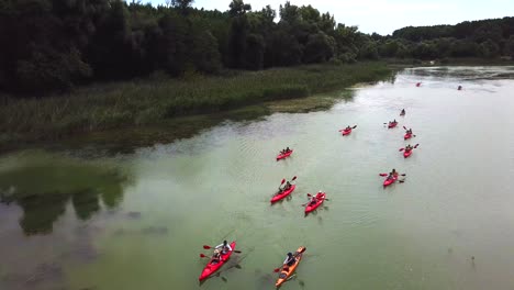 Landscape-aerial-view-of-people-kayaking-on-Danube-river,-Hungary