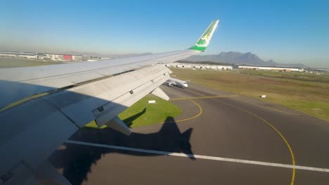 FlySafair-wing-view-touchdown-airbrakes-Cape-Town