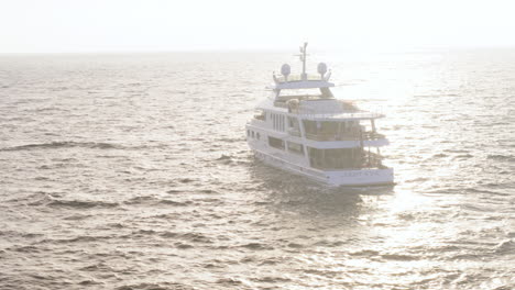 Round-drone-shot-of-ship-sailing-in-the-ocean