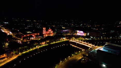 An-astonishing-aerial-video-of-a-city-where-structures-are-lit-by-led-lights-in-the-night-in-Roxas,-Capiz,-Philippines