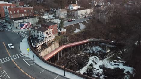 The-Wappinger-Creek-falls-and-downtown-Wappingers-Falls-is-shown-in-this-4K-aerial-footage