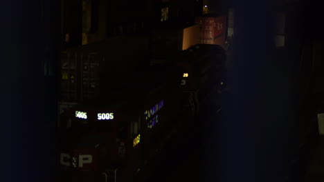 Focus-pulling-Cargo-Train-on-railway-shot-from-bridge-above