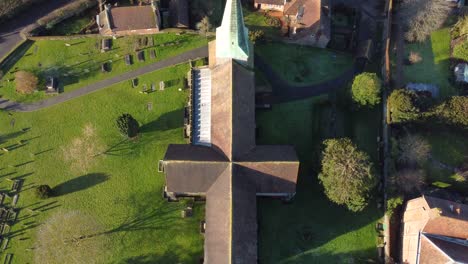 Overhead-drone-footage-of-a-medieval-church-in-England