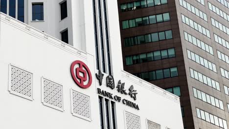 Close-up-panning-up-shot-capturing-the-building-exterior-signage-of-bank-of-china-at-downtown-civic-district-at-Singapore