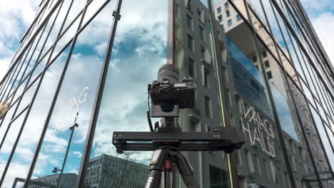 Camera-Slider-Shooting-Timelapse-Video-Outside-Vaaghals-Restaurant-Building-In-Oslo,-Norway-At-Daytime