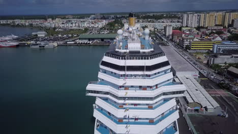 Aerial-view-of-the-front-of-Costa-Pacifica-cruise-ship-docked-in-the-port-of-Pointe-à-Pitre,-Guadeloupe