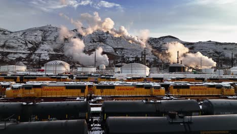 Beautiful-View-Towards-Refinery-and-over-Pacific-Union-Company-Rails-at-North-Salt-Lake-Utah---Aerial-Forward-Movement