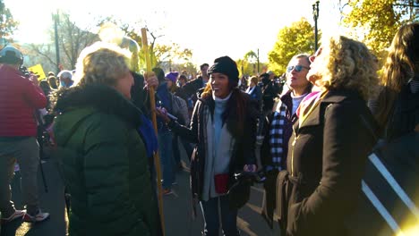 African-American-woman-sharing-her-story-with-a-group-of-white-women