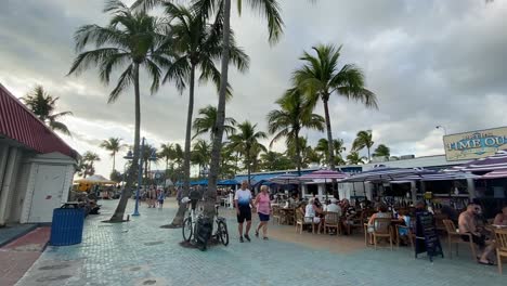 People-at-Times-square-plaza-in-Fort-Myers-beach,-West-Florida