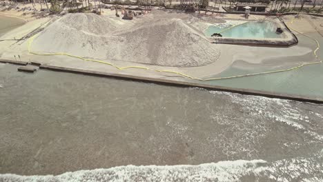 Aerial-view-of-sand-restoration-project-on-Waikiki-beach-tilt-up