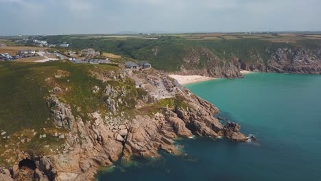 Aerial:-Minack-Theatre-open-air-theatre-in-Porthcurno,-arc-shot