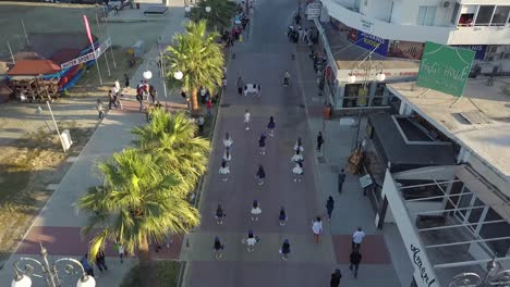 Overtake-Shot-Of-People-Wearing-Costumes-Walking-In-Beautiful-Parade