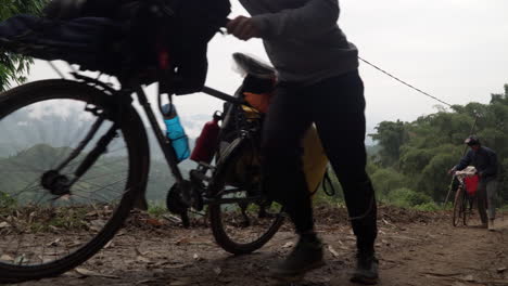 Cyclist-going-uphill-in-a-ground-path