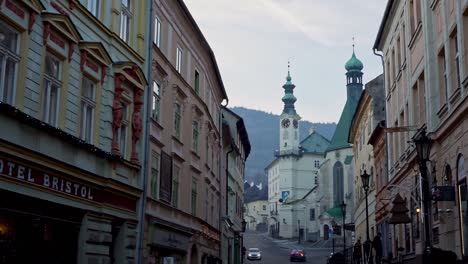 View-on-the-street,-hotel-and-church-at-the-city-of-Banska-Stiavnica,-Slovakia