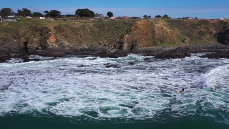 surfing-in-punta-de-lobos-chile-sunny-day-incredible-landscape-recorded-with-drone