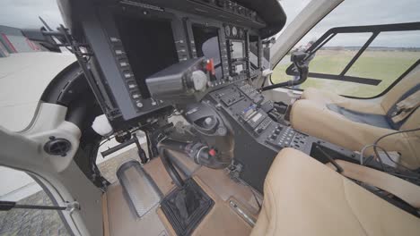 Get-a-glimpse-from-inside-the-cockpit-of-the-Bell-249-helicopter,-experiencing-the-pilot's-perspective-and-control-panel
