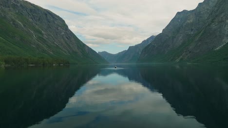 Iconic-lake-of-Norway-and-mountains,-aerial-view