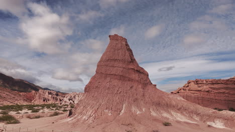 A-drone-shot-of-the-natural-Obelisco-rock-formation-in-the-Calchaquí-Valley,-Salta,-Argentina