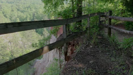 Fence-on-edge-of-falling-into-canyon-at-providence-canyon-state-park
