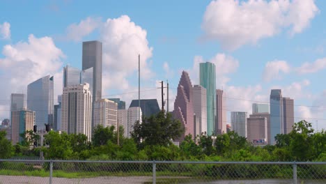 Establishing-shot-of-downtown-Houston,-Texas-on-cloudy-but-sunny-day