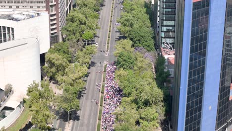 Aerial-shot-of-woman’s-demonstration-day-in-mexico-city-at-Paseo-de-la-reforma-avenue