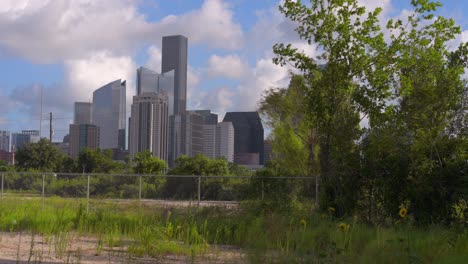 Establishing-shot-that-moves-to-the-left-to-reveal-downtown-Houston,-Texas