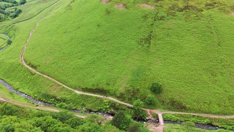 Pan-shot-of-narrow-passage-of-Dane-river-passing-through-Dane-valley-in-England