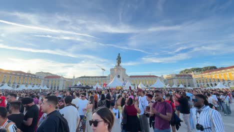 People-dancing,-celebrating-diversity,-and-embracing-equality-of-the-Arraial-Lisboa-Pride-at-Praça-do-Comércio-Square,-Lisbon,-Portugal